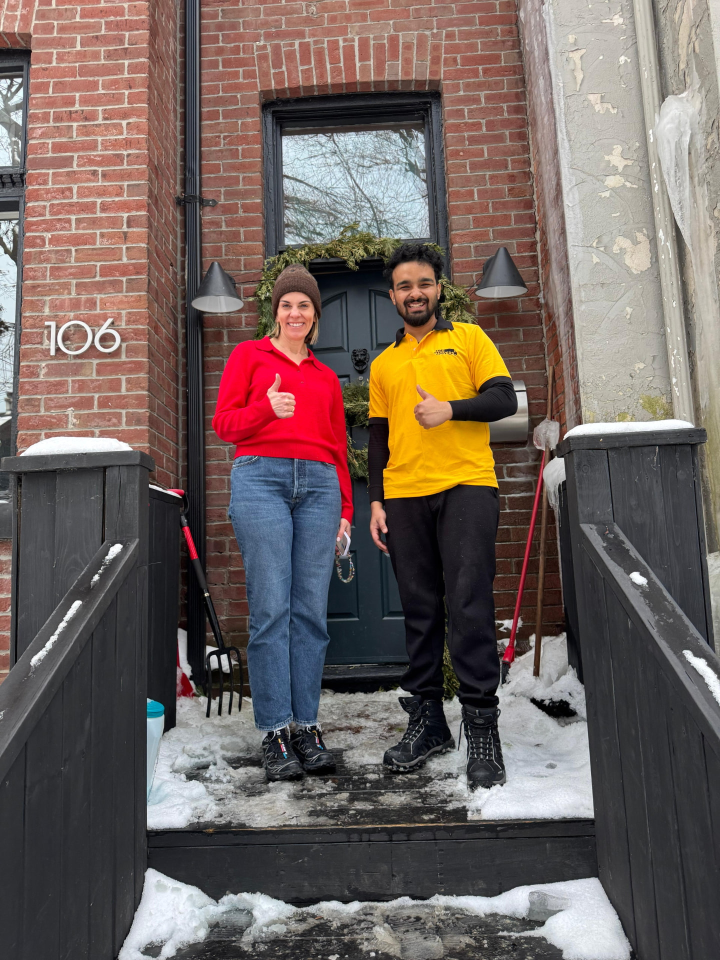 Acemovers mover and customer giving a thumbs up outside a Toronto home